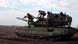 Soldiers on a Russian T-90M Proryv tank Soldiers on a Russian T-90M Proryv tank