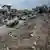 South Korean U.N peacekeeper drives past destroyed buildings in Chehabiyeh village, southern Lebanon, Thursday, Nov. 28, 2024 following a ceasefire between Israel and Hezbollah that went into effect on Wednesday.