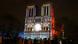 Luces multicolores se proyectan sobre la fachada de la renovada catedral de Notre Dame Luces multicolores se proyectan sobre la fachada de la renovada catedral de Notre Dame