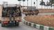 Rebel fighters sit on a vehicle in Homs countryside, in Syria December 7, 2024. Rebel fighters sit on a vehicle in Homs countryside, in Syria December 7, 2024.