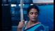 A woman holds a pole. A woman holds a pole.