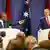 Australian Prime Minister Anthony Albanese (R) reacts as Papua New Guinea's Prime Minister James Marape speaks during a press conference in Sydney on December 12, 2024