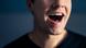 Picture of a person's mouth, opened while singing. Picture of a person's mouth, opened while singing.