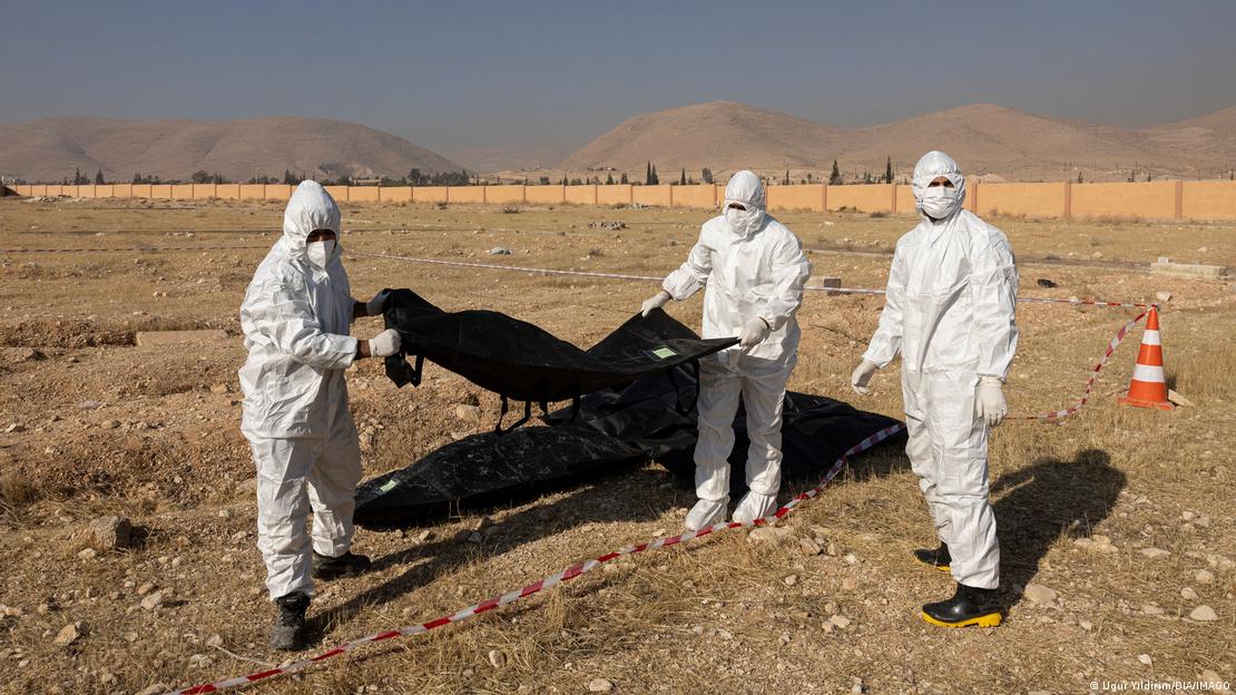 Image 2: Seven bodies were found in bags in the same grave in a military facility in Douma, near Damascus, Syria, on December 17, 2024. 