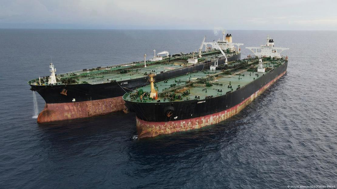 A picture showing an Iranian-flagged oil tanker and a Cameroon-flagged tanker after they were caught conducting illegal oil transfer near Natuna waters, Indonesia
