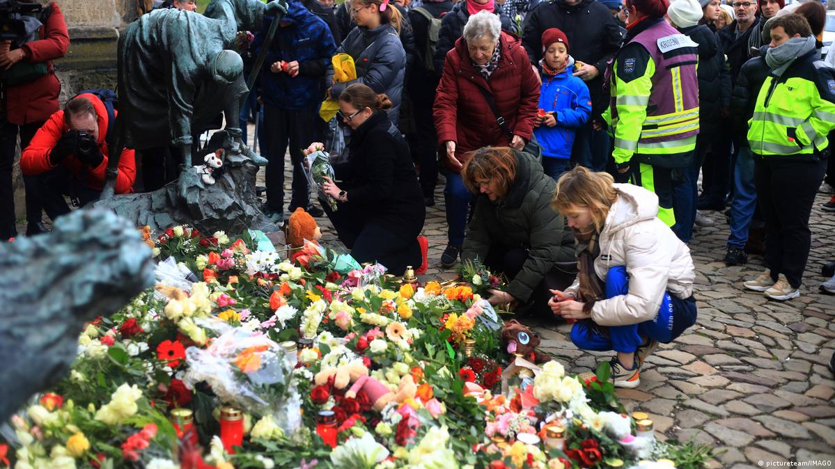 Magdeburg, Germany: people lay flowers at a memorial to the attack at the city's christmas market, December 21, 2024.