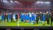 Magdeburg players link arms in front of their fans after the tragic events in the city Magdeburg players link arms in front of their fans after the tragic events in the city