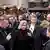 German Interior Minister Nancy Faeser gesturing while surrounded by people at Christmas market in Magdeburg, Saxony-Anhalt, Germany