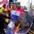 Panamanian protesters burn poster with Donald Trump on it