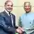 Shehbaz Sharif dan Muhammad Yunus (kanan)