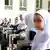 Girl students are seen in the schoolyard in Kabul, Afghanistan (2022 file)