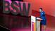 Sahra Wagenknecht steht im blauen Kleid am Rednerpult und spricht gestikulierend zu den Delegierten auf dem Parteitag des nach ihr benannten Bündnisses Sahra Wagenknecht (BSW). Schräg hinter hier stehen drei etwa 1 Meter 50 hohe Buchstaben aus Styropor: BSW. Sahra Wagenknecht steht im blauen Kleid am Rednerpult und spricht gestikulierend zu den Delegierten auf dem Parteitag des nach ihr benannten Bündnisses Sahra Wagenknecht (BSW). Schräg hinter hier stehen drei etwa 1 Meter 50 hohe Buchstaben aus Styropor: BSW.