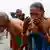 Devotees bathe in the river in Prayagraj.