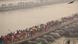Hindu devotees cross pontoon bridges spanning the river Ganga as they arrive to attend the "Maha Kumbh Mela Hindu devotees cross pontoon bridges spanning the river Ganga as they arrive to attend the "Maha Kumbh Mela