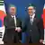 South Korean Foreign Minister Cho Tae-yul, right, shakes hands with Japanese Foreign Minister Takeshi Iwaya during their meeting at the foreign ministry in Seoul, South Korea, Monday, Jan. 13, 2025. 
