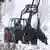 A dead buffalo hangs from a tractor on a farm in Germany after an outbreak of foot-and-mouth disease