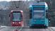 A red and a blue tram in Frankfurt's city center A red and a blue tram in Frankfurt's city center