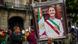 Una persona sostiene una imagen de la presidenta Claudia Sheinbaum. Una persona sostiene una imagen de la presidenta Claudia Sheinbaum.