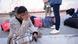 Una mujer migrante se tapa el rostro, afectada por las medidas migratorias en EE. UU. Una mujer migrante se tapa el rostro, afectada por las medidas migratorias en EE. UU.