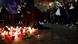 People lighting candles after the attack in Aschaffenburg on January 22, 2025