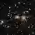 El cúmulo de galaxias de Coma se encontró 38 millones de años-luz más cerca de lo predicho por el modelo estándar.