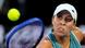 Madison Keys grimaces while hitting a backhand return during the women's singles final at the Australian Open Madison Keys grimaces while hitting a backhand return during the women's singles final at the Australian Open
