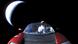 El Tesla Roadster rojo de Elon Musk, junto con su pasajero Starman, fue confundido con un asteroide mientras viajaba a menos de 240.000 kilómetros de la Tierra. El Tesla Roadster rojo de Elon Musk, junto con su pasajero Starman, fue confundido con un asteroide mientras viajaba a menos de 240.000 kilómetros de la Tierra.