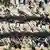 A drone view shows people gathering near vehicles of the International Committee of the Red Cross 