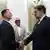 Richard Grenell shaking hands with Nicolas Maduro
