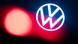Volkswagen logo and red light in Wolfsburg on February 5, 2025 Volkswagen logo and red light in Wolfsburg on February 5, 2025