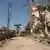 A general view shows damage and debris in the southern Lebanese village of al-Taybeh, near the border with Israel, on February 4, 2025