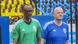 Paul Kagame and Gianni Infantino walk at a stadium with a crowd behind. Kagame is wearing a green football shirt, Infantino a blue one Paul Kagame and Gianni Infantino walk at a stadium with a crowd behind. Kagame is wearing a green football shirt, Infantino a blue one