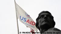 The flag of the United States Agency for International Development (USAID) outside their headquarters in Washington, DC.