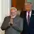 Prime Minister Modi looks gleeful as he exits a doorway with President Trump at the White House in Washington