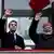 Emmanuel Marcon and Narendra Modi wave from the Indian embassy in Marseille