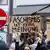 Demonstrators in Aschaffenburg holding up a sign reading 'Fascism is not an opinion'