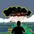 An illustration depicting a silhouette of a person looking out onto a raincloud and solar panels