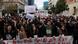 Young men and women in a crowd chant slogans and hold up banners and signs with messages in Greek, one of which reads 'I have no oxygen' Young men and women in a crowd chant slogans and hold up banners and signs with messages in Greek, one of which reads 'I have no oxygen'