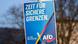 Cartel de AfD que pone en alemán "Zeit für sichere Grenzen" (Hora de fronteras seguras) Cartel de AfD que pone en alemán "Zeit für sichere Grenzen" (Hora de fronteras seguras)