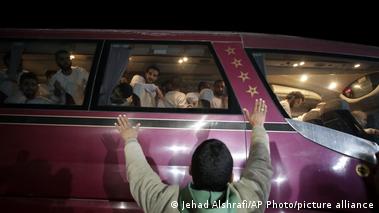 Freed Palestinian prisoners are greeted as they arrive in the Gaza Strip after being released from an Israeli prison following a ceasefire agreement between Hamas and Israel in Khan Younis, Gaza Strip, Thursday, Feb. 27, 2025.