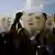 People holding Ocalan banners at DEM party protest
