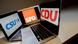 Laptops showing the logos of the CDU, SPD and CSU Laptops showing the logos of the CDU, SPD and CSU
