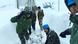 Rescue workers in Uttarakhand state working in deep snow Rescue workers in Uttarakhand state working in deep snow