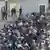 Foreign nationals, mostly Chinese, are seen on February 26, 2025, at a building in KK Park, a compound of scam centers