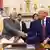 Indian PM Narendra Modi (left) and US President Donald Trump (right) shaking hands at the White House on February 13, 2025