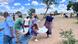 Zimbabwean women lift bags of food in Manicaland Zimbabwean women lift bags of food in Manicaland