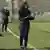 Helen Nkwocha on the touchline