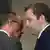 Friedrich Merz (left) and Lars Klingbeil (right) talking during a press conference in Berlin on March 4, 2025