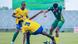 A Rwandan player attempts to steal the ball from a South African player A Rwandan player attempts to steal the ball from a South African player