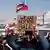 Protesters in Greenland gather in front of the US consulate holding signs such as 'We are not for sale!'